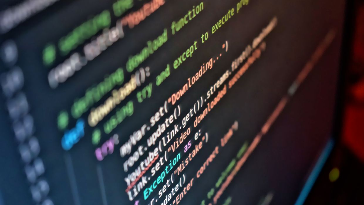 Structured data: vivid close-up of code on a computer screen showcasing programming details