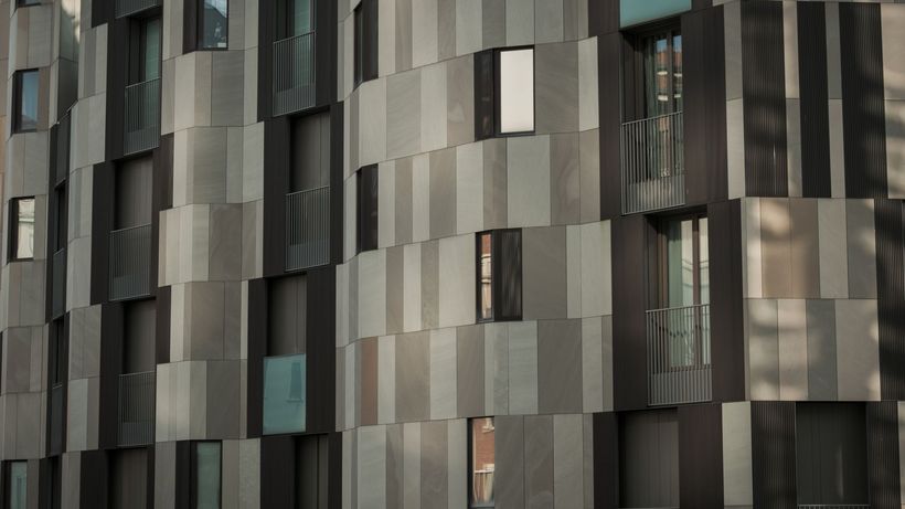 Contemporary urban building with a unique geometric facade and modern architectural design