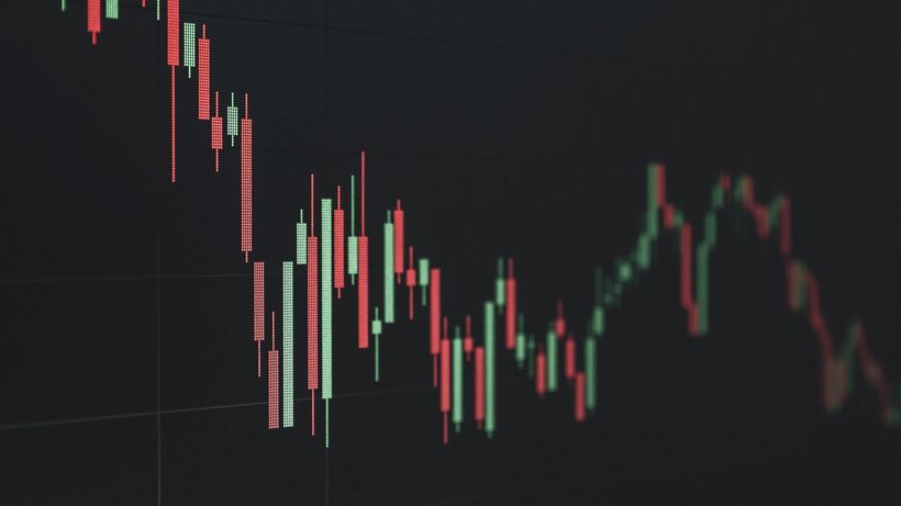 Stock market data chart showing trends in red and green. Perfect for financial and business themes