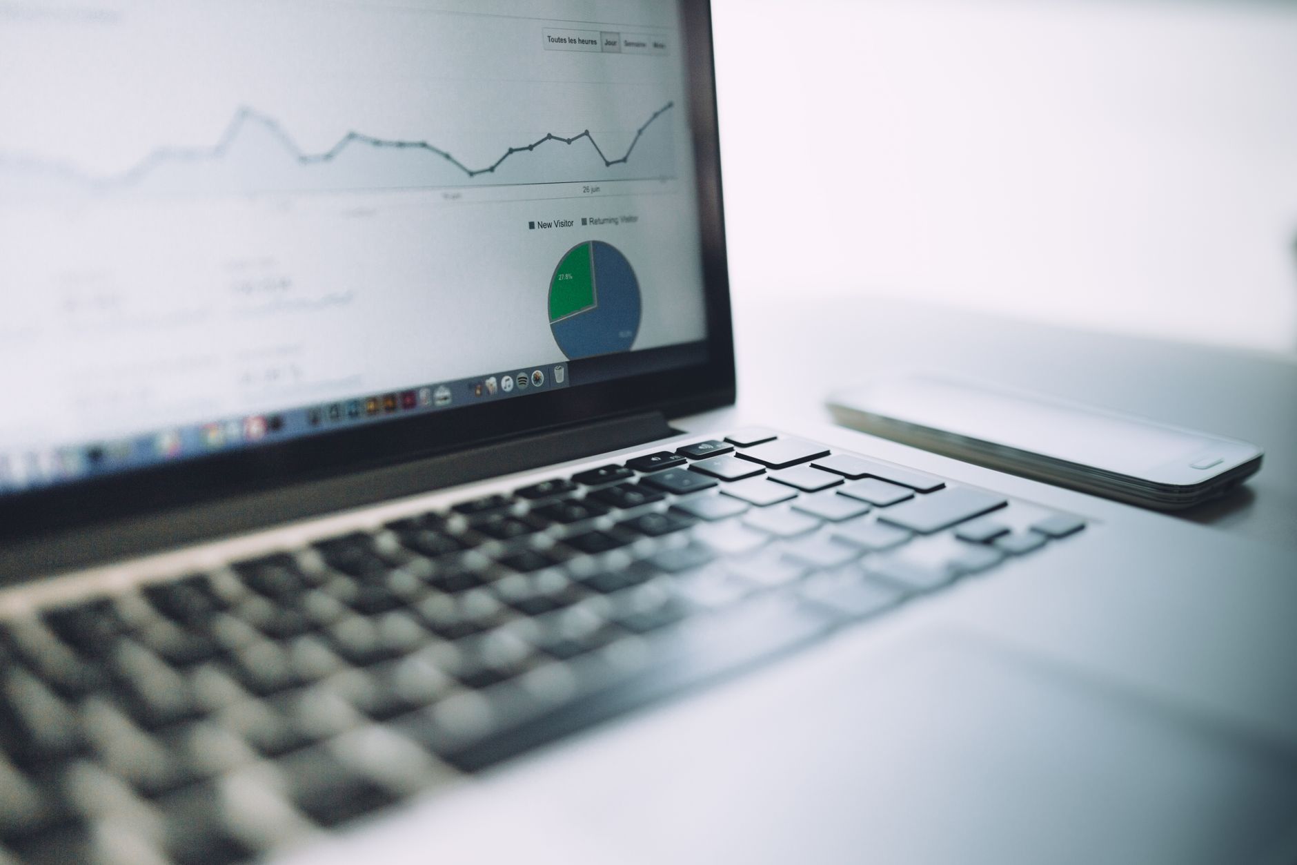 Close-up of website traffic analytics on a laptop