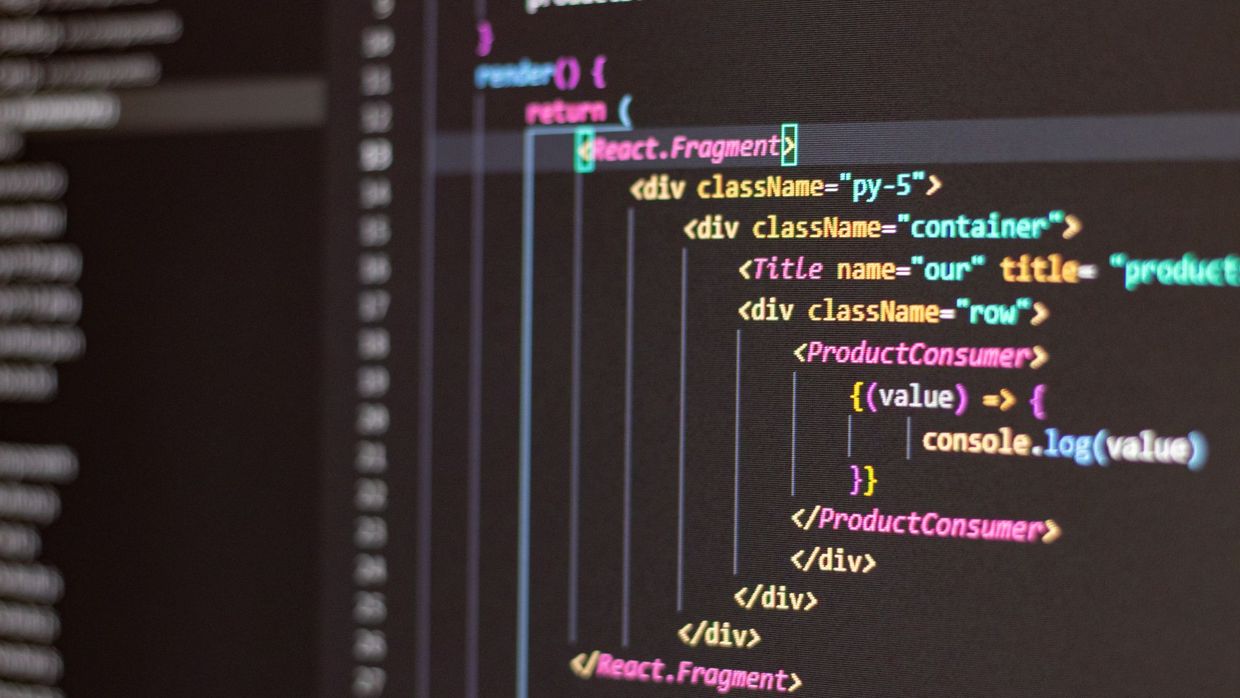 Technical SEO: close-up of HTML and JavaScript code on a computer screen in Visual Studio Code