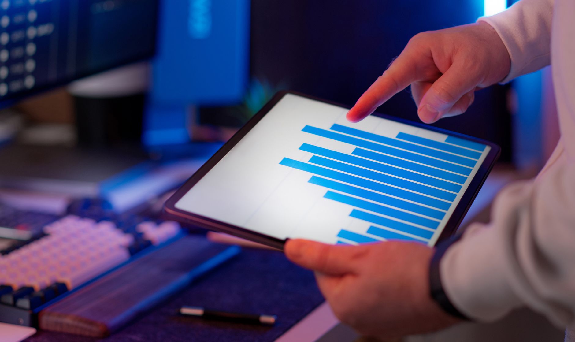 Tablet displaying a data chart in a modern workspace